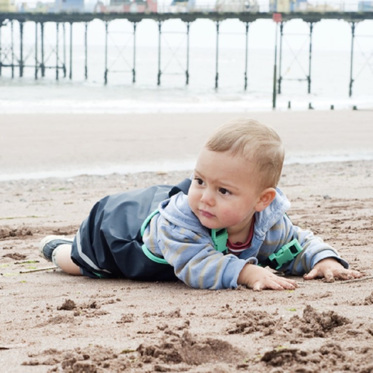 Child Playing on the Beach © Pavla Zakova