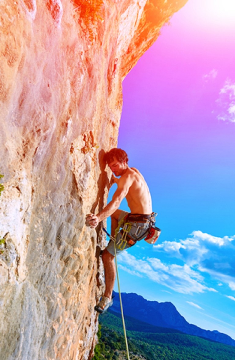 Rock Climber Climbing a Cliff © Vitaliy Mateha.jpg